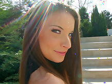 Anita Bellini slides out of her tight jeans outdoors