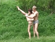 Swinger couples playing in water after a hard sex Orgía