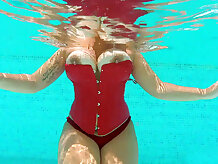 Busty British lady Anastasia Lux posing in the pool - Anastasia Lux