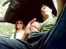 Ava Austen strokes hitchhiker Jordi's massive cock while driving the car - Ava Austen